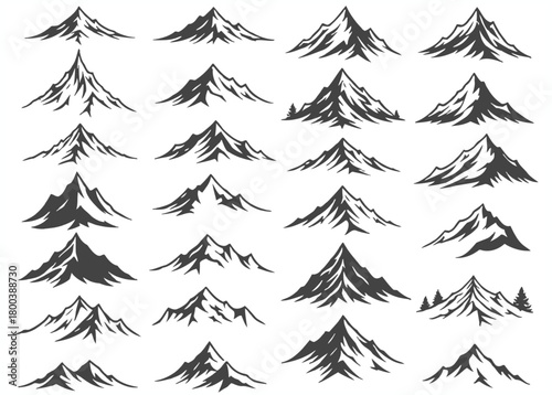 Collection of hand drawn sketch style mountain peaks isolated on white background