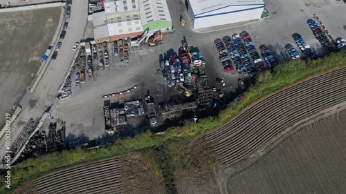Aerial view of damaged vehicles and salvage yard in rural area after fire incident at Copart yard, York, North Yorkshire.