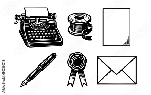 Vintage writing set with typewriter, fountain pen, and stationery elements in black and white