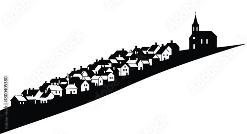 Charming village nestled on a rolling hillside with a prominent church steeple.