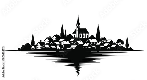 Charming village skyline with church steeple reflected in water