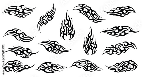 Collection of tribal tattoo designs isolated on, featuring various flame and wave patterns