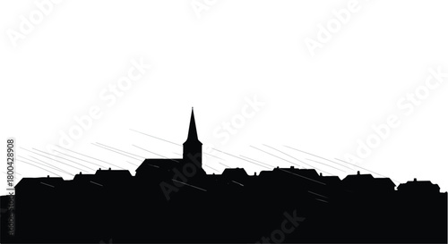 Serene silhouette of a charming European town skyline against a bright sky.