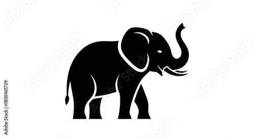 Majestic elephant silhouette in profile, a powerful symbol of strength, wisdom, and the wild, ideal for diverse graphic design projects, representing nature's grandeur and iconic animal