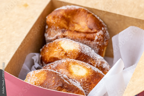 A malasada is a Portugese doughnut without a hole. Leonard's Malasada Mobile. Food truck. Windward Mall, Kāne‘ohe, Honolulu, Oahu, Hawaii. Leonard's Bakery. Cuisine of Hawaii.
