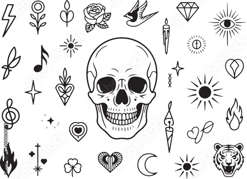 Tattoo flash sheet featuring skull and symbols