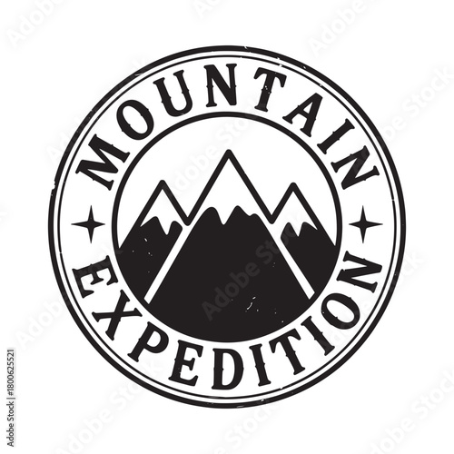 Vintage mountain expedition circular emblem with snow capped peaks