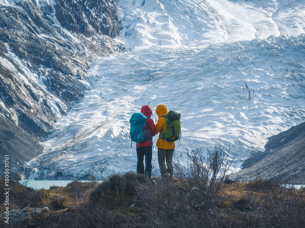 Fototapeta premium Backpacking hikers hiking on high altitude mountain top