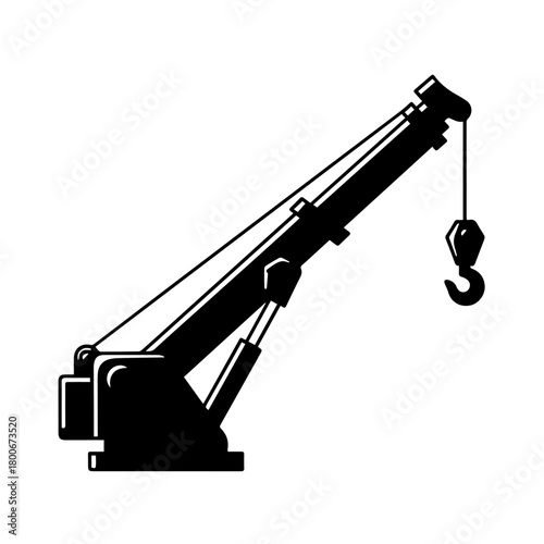 Industrial crane lifting hook over construction site.