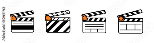 Four movie clapperboards with different designs, isolated on white background.