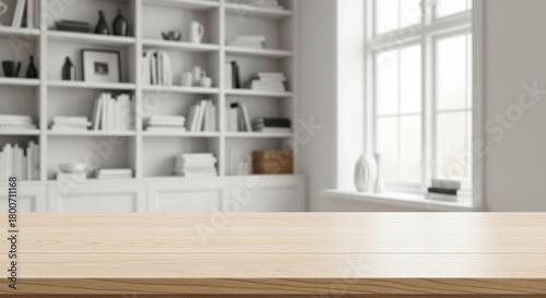 Empty wooden table top with Blur bookshelves in library.