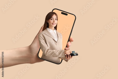 Hand holding mobile phone w...