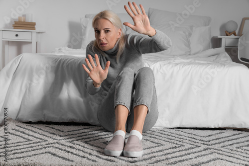 Mature woman having panic a...