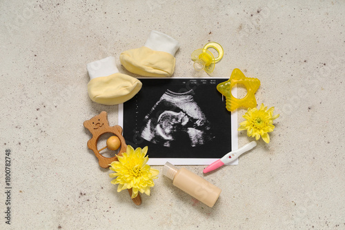 Composition with baby shoes...