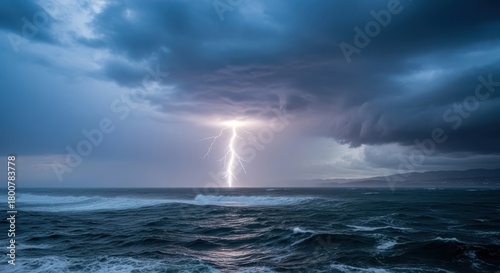 Fototapeta Naklejka Na Ścianę i Meble -  Lightning Bolt Over Ocean at Night