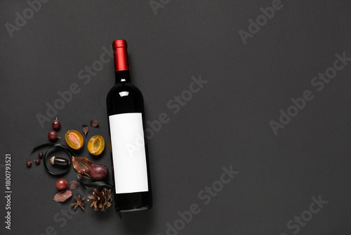 Bottle of wine with fruits,...