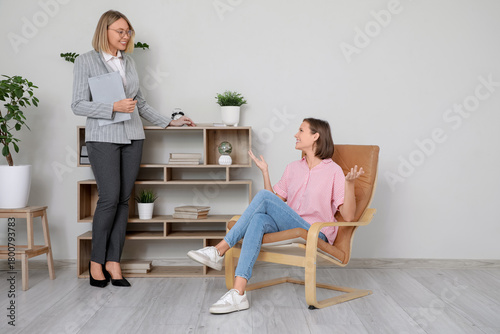 Female psychologist talking...