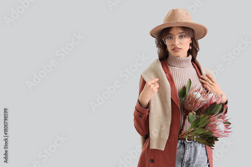 Stylish young woman with pr...