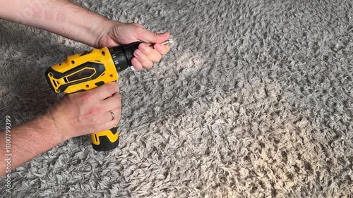 insert bit into holder of electric screwdriver