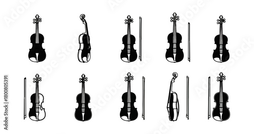 Violin instruments and bows silhouetted on black background