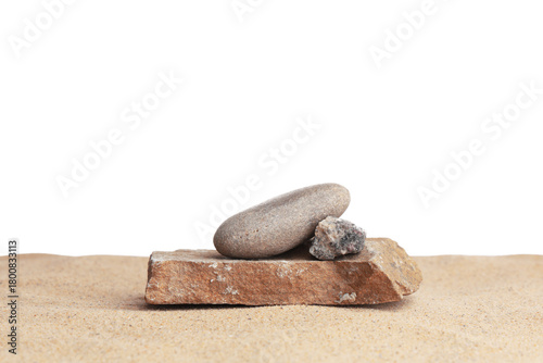 Stones on light beach sand ...