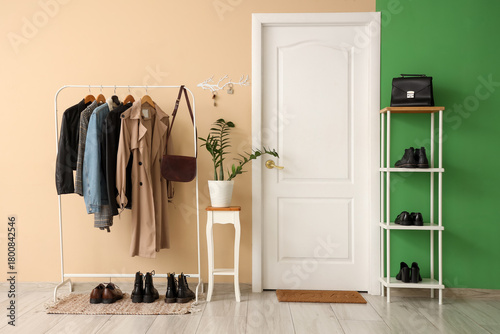 Modern home entryway with c...