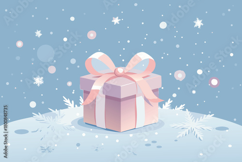 A beautifully wrapped gift sits atop a snow covered hill in winter