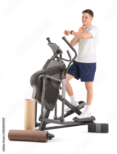 Sporty young man with smart...