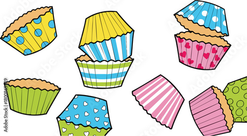 Assorted Colorful Baking Cups Scattered on a White Background