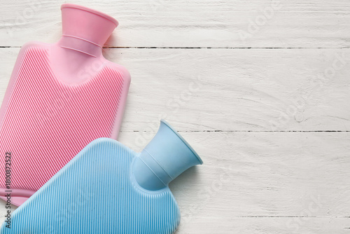 Hot water bottles on white ...