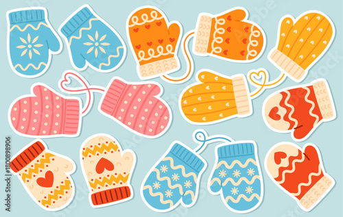 A set of knitted winter mittens stickers. Cozy patterned mittens.