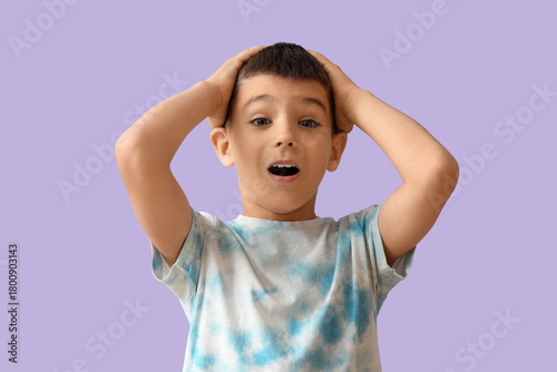 Portrait of shocked little ...