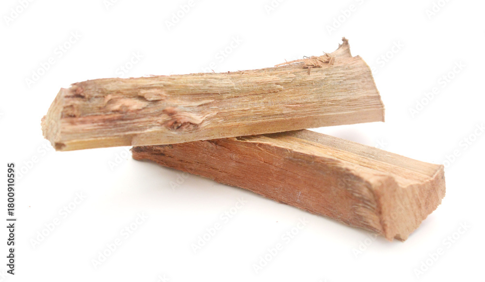 Fototapeta premium Stack of firewoods isolated on white