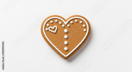 Heart shaped gingerbread cookie with icing for valentine's day or christmas holiday treat design
