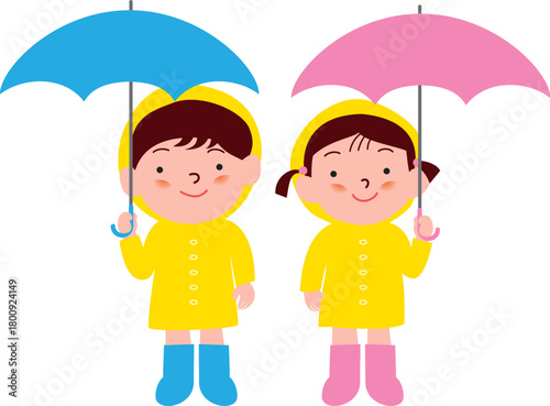傘をさすレインコートの男の子と女の子
