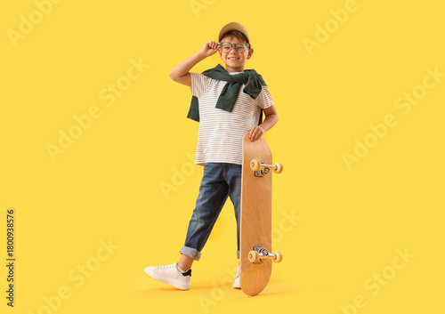 Little boy in eyeglasses wi...