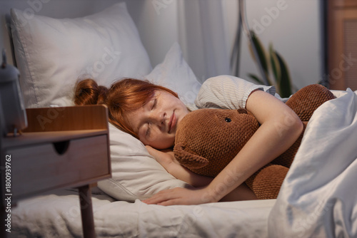 Peaceful young girl sleepin...