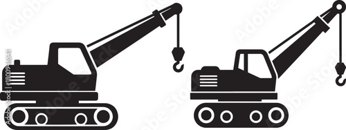 Two crawler crane silhouettes on white background silhouette