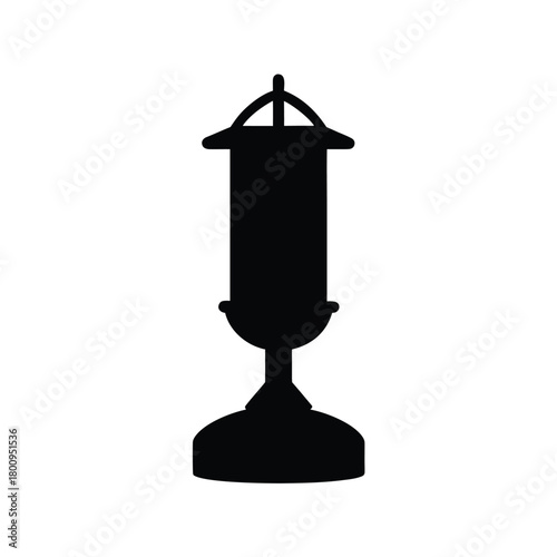 Silhouette of a decorative vintage lantern with a detailed base and top ornament