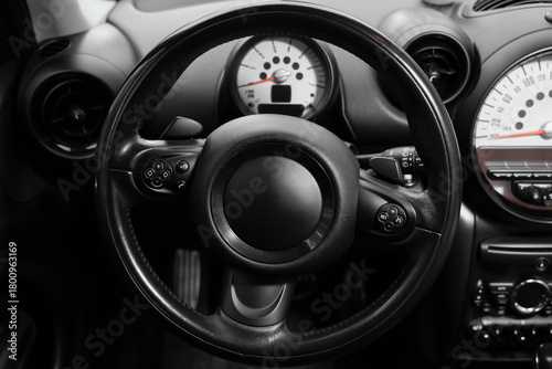 View of black steering whee...