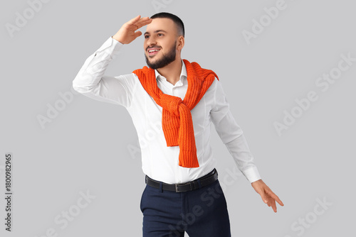 Young businessman looking a...