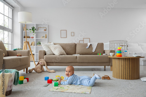 Cute little baby with toys ...