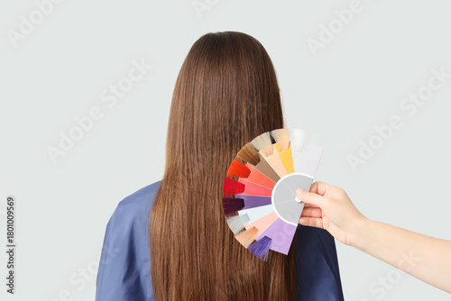 Female hand with hair color...