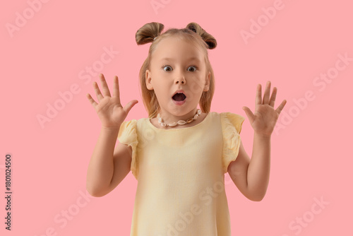 Portrait of shocked little ...