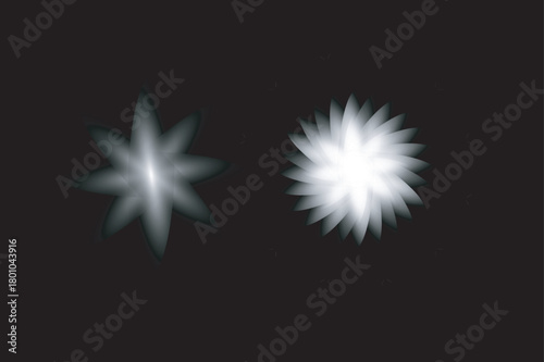 Abstract Glowing Flower Shapes on Black Background