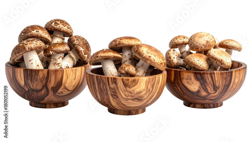 Three wooden bowls filled with fresh shiitake mushrooms