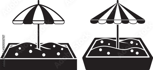 Two sandbox umbrellas silhouette