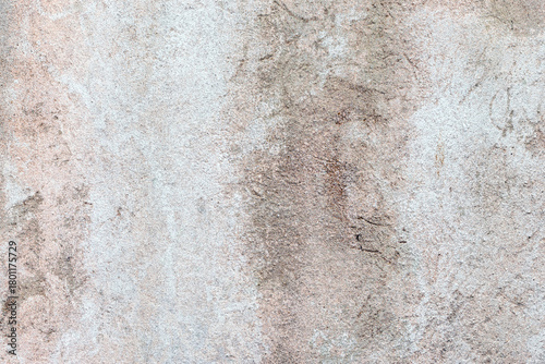 Old rough cement wall texture with light brown stains, natural and rustic look, ideal for background or industrial design use