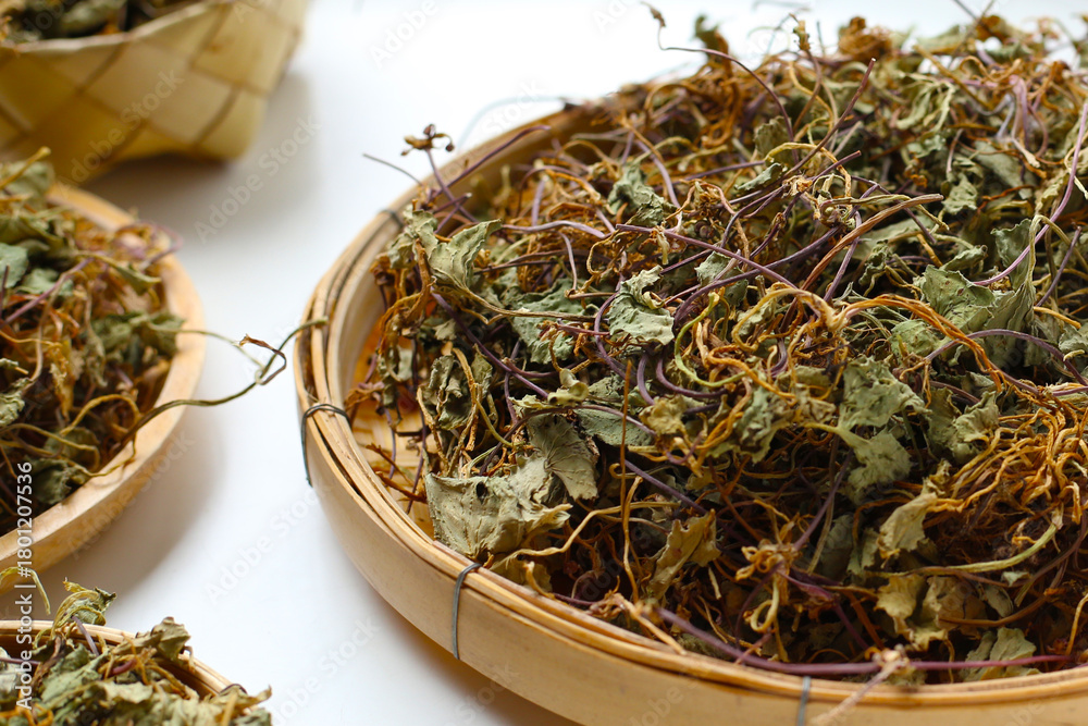 Fototapeta premium Dried gotu kola herb with leaves, stems, and roots