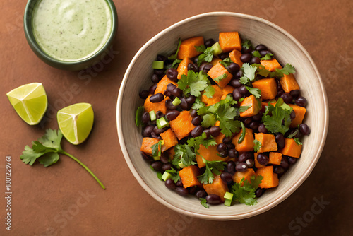 Healthy black bean and sweet potato salad with creamy avocado dressing